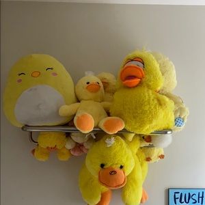 Plush ducks stuffed animals and pillow